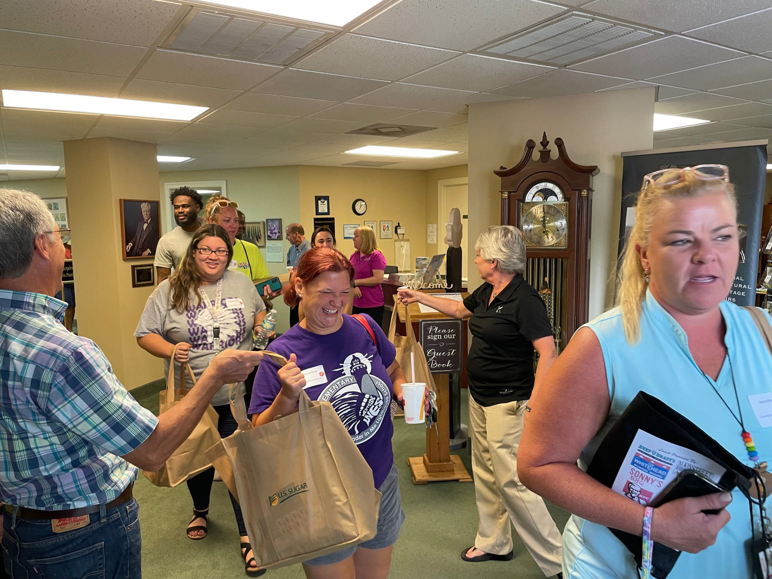 The 130 teachers received a bag of school supplies donated by area businesses.
